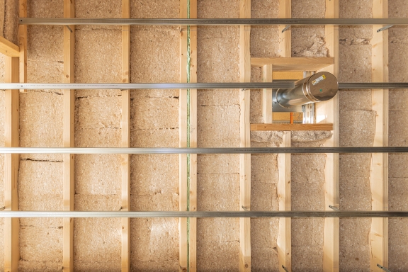 Maison Individuelle, Lac-Des-Rouges-Truites : Réalisation chantier isolation sous plancher maison ossature bois isolant naturel ThermaSoft natura Knauf